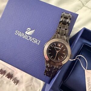 Swarovski Black and Silver Timepiece